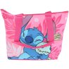 Plážová taška Lilo &amp; Stitch s obrázkem mimozemšťana Stitche a jeho hračky Scrump. Má jednu hlavní komoru s malou vnitřní kapsičkou, obě se zapínáním na zip, a dvě pevná ucha pro nošení přes rameno nebo v ruce.